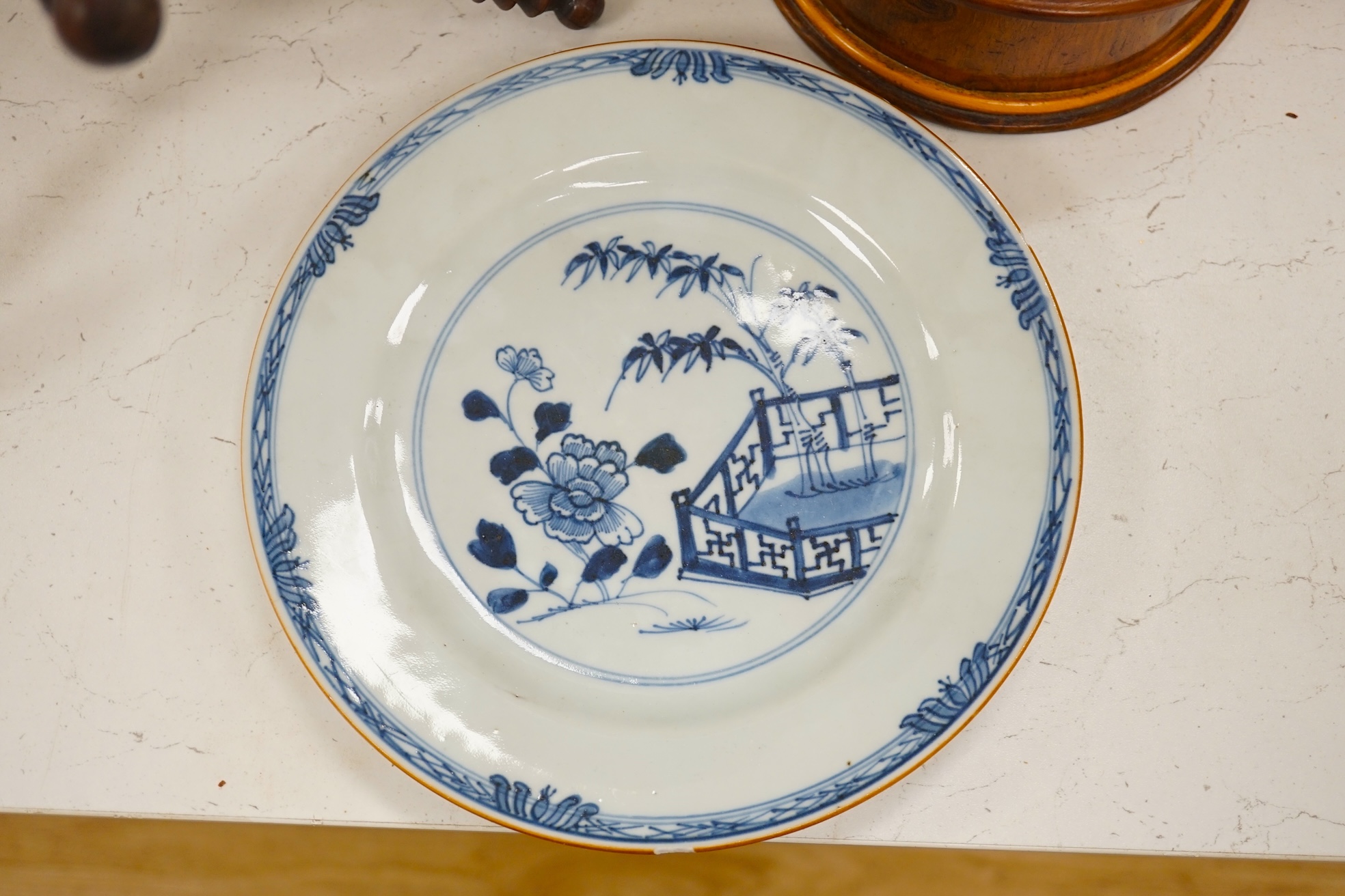 A Chinese blue and white plate, a tea bowl, two pottery bowls and a wooden stand (5). Condition - fair to good.